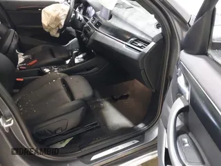 2018 BMW X1 xDrive28i with VIN WBXHT3C38J5L34625, listed as a IAAI auction lot 41133876 with 60,986 mi miles and . Bid and sale history available at DreamBid. Image 5.