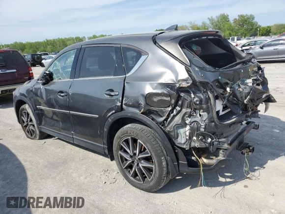 2018 Mazda CX-5 Grand Touring z VIN JM3KFBDM5J0365380, wystawiony jako Copart lot #51040914 z przebiegiem 88 928 mil mil oraz Czysty tytuł • Clean title. Historia ofert i sprzedaży dostępna na DreamBid. Obrazek 2.