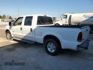 2001 Ford Super Duty F-250 XL with VIN 1FTNW20F61EB42376, listed as a Copart auction lot 74001054 with 215,944 mi miles and Salvage Title. Bid and sale history available at carsss.com. Image 2.