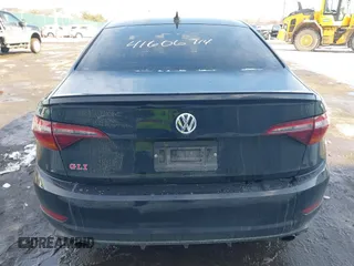 2019 Volkswagen Jetta GLI S z VIN 3VW6T7BU5KM240619, wystawiony jako IAAI lot #41606714 z przebiegiem 86 557 mil mil oraz . Historia ofert i sprzedaży dostępna na DreamBid. Obrazek 16.