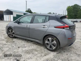 2018 Nissan LEAF SV with VIN 1N4AZ1CP1JC307031, listed as a Copart auction lot 58869215 with 99,621 mi miles and Salvage title. Bid and sale history available at DreamBid. Image 2.