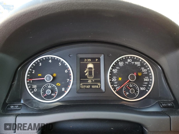 2014 Volkswagen Tiguan SE z VIN WVGAV3AXXEW505398, wystawiony jako Copart lot #41682155 z przebiegiem 137 147 mil mil oraz Nie do naprawy • Non repairable. Historia ofert i sprzedaży dostępna na DreamBid. Obrazek 9.