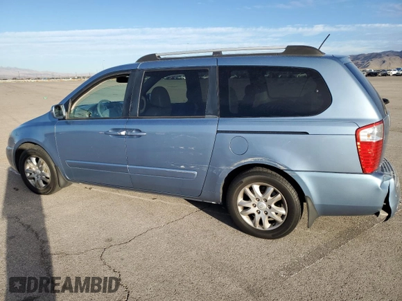 2009 Kia Sedona EX with VIN KNDMB233196275030, listed as a Copart auction lot 71997154 with 96,777 mi miles and Salvage Title. Bid and sale history available at carsss.com. Image 2.