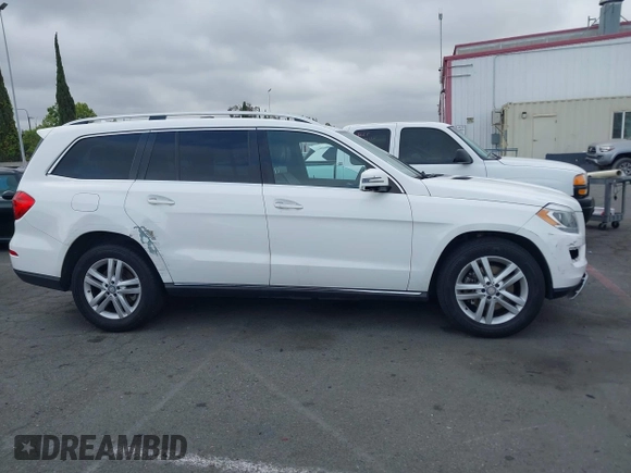2014 Mercedes-Benz GL 450 z VIN 4JGDF7CE0EA424081, wystawiony jako IAAI lot #42359465 z przebiegiem 145 363 mil mil oraz . Historia ofert i sprzedaży dostępna na DreamBid. Obrazek 13.