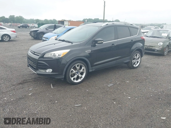 2015 Ford Escape Titanium z VIN 1FMCU0JX7FUB00462, wystawiony jako IAAI lot #42532943 z przebiegiem 88 623 mil mil oraz . Historia ofert i sprzedaży dostępna na DreamBid. Obrazek 17.