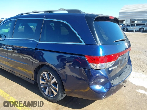 2016 Honda Odyssey Touring Elite with VIN 5FNRL5H98GB083221, listed as a IAAI auction lot 41626604 with 145,341 mi miles and . Bid and sale history available at DreamBid. Image 6.
