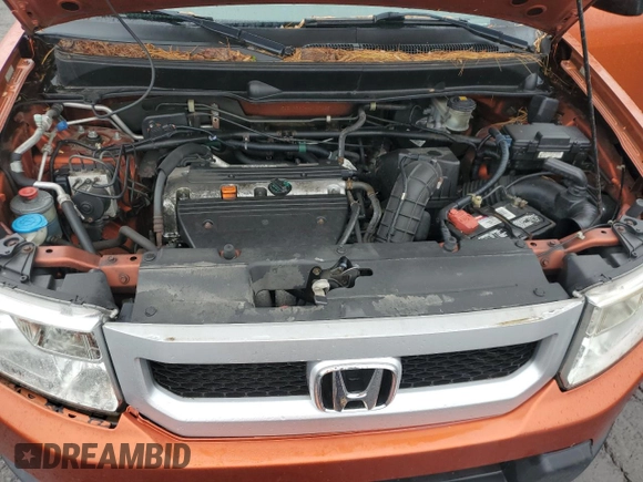2010 Honda Element EX z VIN 5J6YH2H74AL007035, wystawiony jako Copart lot #55643735 z przebiegiem 186 381 mil mil oraz Szkoda całkowita • Salvage title. Historia ofert i sprzedaży dostępna na DreamBid. Obrazek 12.
