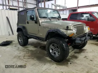 2003 Jeep Wrangler Rubicon z VIN 1J4FA69S13P345591, wystawiony jako Copart lot #41741685 z przebiegiem 85 335 mil mil oraz Szkoda całkowita • Salvage title. Historia ofert i sprzedaży dostępna na DreamBid. Obrazek 4.