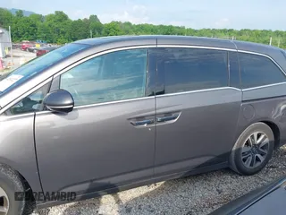 2014 Honda Odyssey Touring with VIN 5FNRL5H99EB111685, listed as a IAAI auction lot 42141227 with 183,484 mi miles and . Bid and sale history available at DreamBid. Image 14.