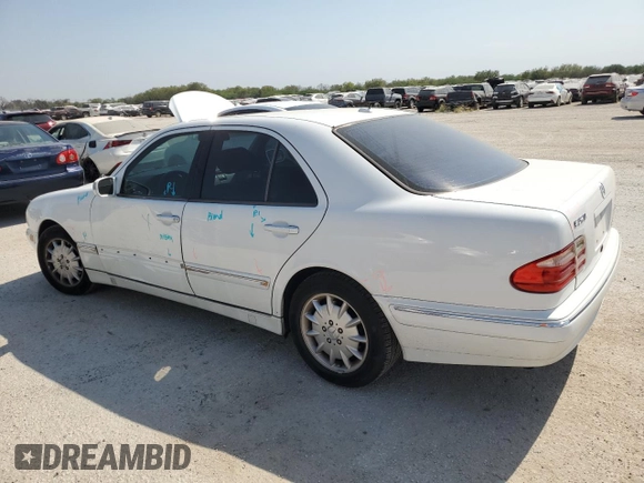 2000 Mercedes-Benz E-Class with VIN WDBJF65J5YB054237, listed as a Copart auction lot 76315974 with 95,092 mi miles and Salvage Title. Bid and sale history available at carsss.com. Image 2.