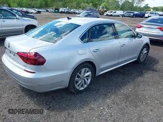 2018 Volkswagen Passat SE z VIN 1VWBA7A38JC004818, wystawiony jako IAAI lot #42205205 z przebiegiem 105 559 mil mil oraz . Historia ofert i sprzedaży dostępna na DreamBid. Obrazek 4.
