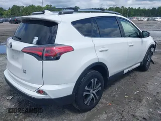 2017 Toyota RAV4 LE with VIN JTMBFREV8HJ700774, listed as a IAAI auction lot 42439345 with 96,907 mi miles and . Bid and sale history available at DreamBid. Image 4.