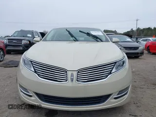 2014 Lincoln MKZ z VIN 3LN6L2GK4ER828656, wystawiony jako IAAI lot #41285297 z przebiegiem 102 513 mil mil oraz . Historia ofert i sprzedaży dostępna na DreamBid. Obrazek 12.