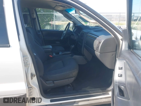 2002 Jeep Grand Cherokee Laredo with VIN 1J4GW48S22C131470, listed as a IAAI auction lot 42599375 with 200,815 mi miles and . Bid and sale history available at DreamBid. Image 5.