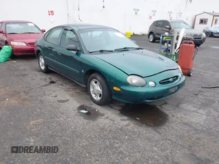 1999 Ford Taurus z VIN 1FAFP52S9XG309250, wystawiony jako IAAI lot #41797222 z przebiegiem 102 676 mil mil oraz . Historia ofert i sprzedaży dostępna na DreamBid. Obrazek 1.