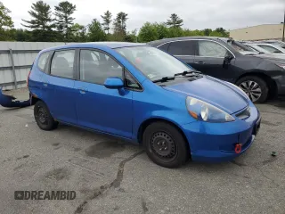 2007 Honda Fit with VIN JHMGD38497S020207, listed as a Copart auction lot 57447875 with 185,603 mi miles and Salvage title. Bid and sale history available at DreamBid. Image 4.