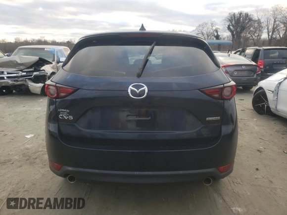 2020 Mazda CX-5 Grand Touring with VIN JM3KFADM4L1783968, listed as a Copart auction lot 85994244 with 89,074 mi miles and Salvage Title. Bid and sale history available at DreamBid. Image 6.