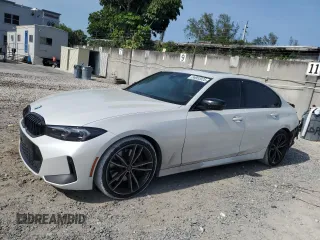 2023 BMW 3 Series 330i z VIN 3MW69FF03P8C91360, wystawiony jako Copart lot #56052025 z przebiegiem 46 954 mil mil oraz Szkoda całkowita • Salvage title. Historia ofert i sprzedaży dostępna na DreamBid. Obrazek 1.