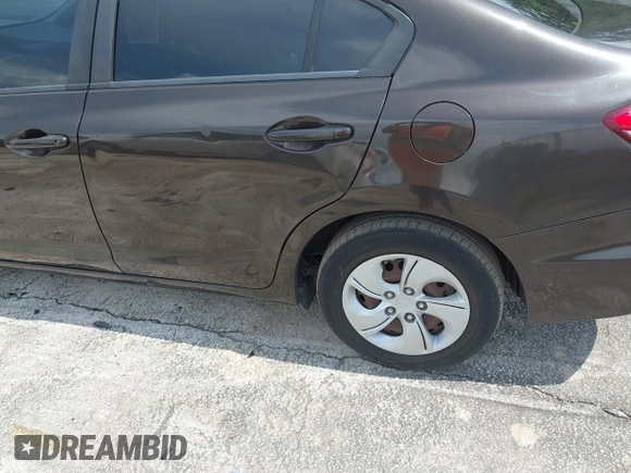 2013 Honda Civic LX with VIN 2HGFB2F54DH511717, listed as a IAAI auction lot 42395720 with 112,971 mi miles and . Bid and sale history available at DreamBid. Image 6.