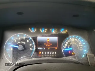 2014 Ford F-150 XL с VIN 1FTMF1EM8EFA25671, выставлен на аукционе Copart как лот 58941145 с пробегом 183 542 миль миль и Списание • Salvage title. История ставок и продаж доступна на DreamBid. Изображение 9.