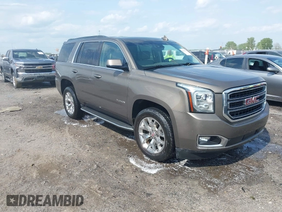 2016 GMC Yukon SLT with VIN 1GKS1BKC9GR328861, listed as a IAAI auction lot 42010839 with 200,711 mi miles. Bid and sale history available at carsss.com. Image 1.