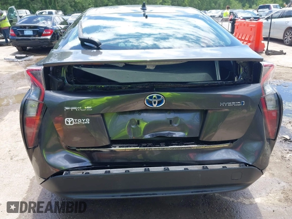2016 Toyota Prius Two z VIN JTDKBRFU2G3014010, wystawiony jako IAAI lot #42254617 z przebiegiem 171 521 mil mil oraz . Historia ofert i sprzedaży dostępna na DreamBid. Obrazek 6.