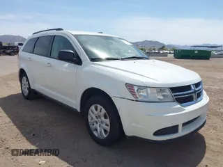 2016 Dodge Journey SE with VIN 3C4PDCAB5GT219313, listed as a IAAI auction lot 41933481 with 131,521 mi miles. Bid and sale history available at carsss.com. Image 1.