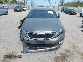2015 Kia Optima LX z VIN 5XXGM4A76FG421945, wystawiony jako IAAI lot #42112703 z przebiegiem 106 050 mil mil oraz . Historia ofert i sprzedaży dostępna na DreamBid. Obrazek 13.