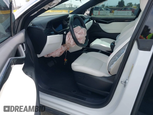 2021 Tesla Model X Long Range Plus with VIN 5YJXCBE23MF321243, listed as a IAAI auction lot 42100580 with 59,878 mi miles and . Bid and sale history available at carsss.com. Image 5.