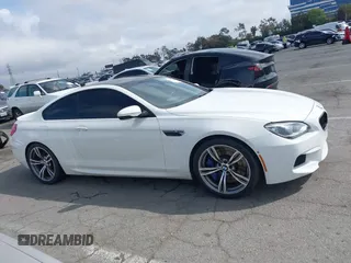 2013 BMW M6 z VIN WBSLX9C50DC968892, wystawiony jako IAAI lot #41935486 z przebiegiem 105 736 mil mil oraz . Historia ofert i sprzedaży dostępna na DreamBid. Obrazek 13.