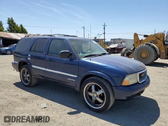 2001 GMC Jimmy SLE Rental Fleet z VIN 1GKDT13W212108144, wystawiony jako Copart lot #58753865 z przebiegiem 254 402 mil mil oraz Szkoda całkowita • Salvage title. Historia ofert i sprzedaży dostępna na DreamBid. Obrazek 4.