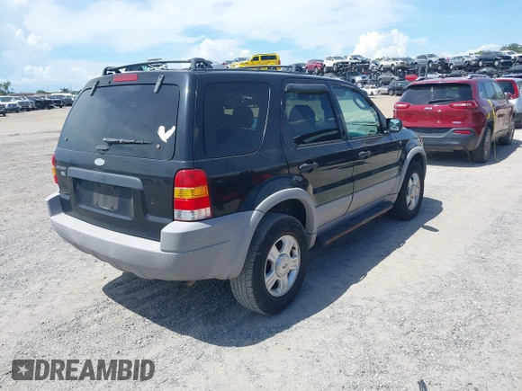 2002 Ford Escape XLT Choice with VIN 1FMYU03112KC99920, listed as a IAAI auction lot 42687111 with 172,920 mi miles and . Bid and sale history available at DreamBid. Image 4.