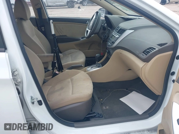 2013 Hyundai Accent GLS with VIN KMHCT4AE3DU325550, listed as a IAAI auction lot 41185651 with 128,791 mi miles and . Bid and sale history available at DreamBid. Image 5.