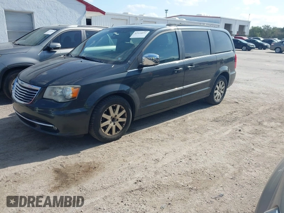 2011 Chrysler Town & Country Touring-L with VIN 2A4RR8DG4BR784138, listed as a IAAI auction lot 42124052 with 105,645 mi miles. Bid and sale history available at carsss.com. Image 2.