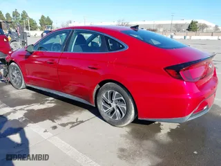2020 Hyundai Sonata Hybrid Blue with VIN KMHL24JJ1LA009550, listed as a IAAI auction lot 41265226 with 85,347 mi miles. Bid and sale history available at carsss.com. Image 3.