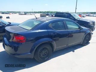 2014 Dodge Avenger SE with VIN 1C3CDZAB6EN148741, listed as a IAAI auction lot 42094363 with 126,598 mi miles and . Bid and sale history available at carsss.com. Image 4.