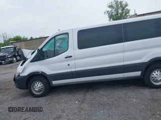 2023 Ford Transit Passenger XL with VIN 1FBAX9Y83PKC08567, listed as a IAAI auction lot 39883261 with 15,028 mi miles and . Bid and sale history available at DreamBid. Image 14.