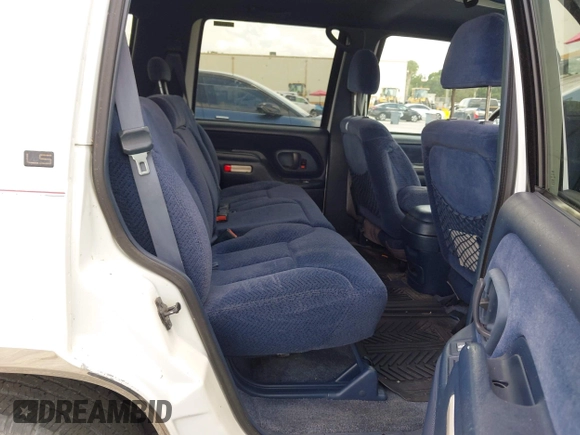 1995 Chevrolet Tahoe with VIN 1GNEC13K9SJ414611, listed as a IAAI auction lot 42798752 with 205,988 mi miles and . Bid and sale history available at DreamBid. Image 8.