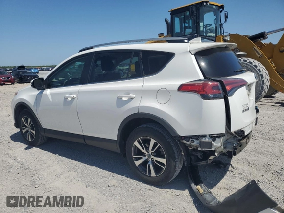 2018 Toyota RAV4 XLE with VIN 2T3WFREV7JW512949, listed as a Copart auction lot 52546345 with 41,558 mi miles and Salvage Title. Bid and sale history available at DreamBid. Image 2.