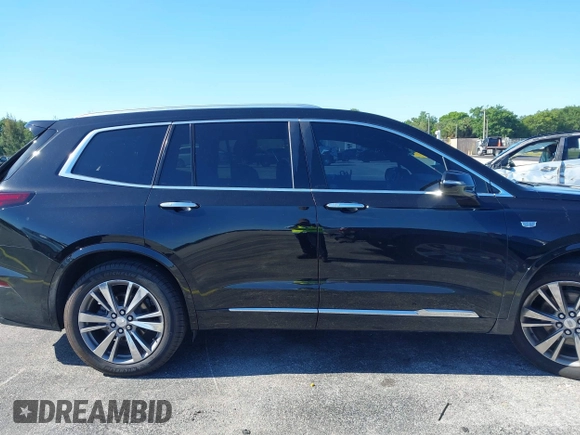 2020 Cadillac XT6 FWD Premium Luxury with VIN 1GYKPCRS7LZ211197, listed as a IAAI auction lot 42231424 with 57,351 mi miles and . Bid and sale history available at DreamBid. Image 13.