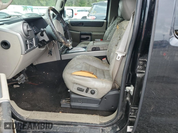 2003 Hummer H2 with VIN 5GRGN23U93H111760, listed as a Copart auction lot 79600154 with 154,552 mi miles and Salvage Title. Bid and sale history available at carsss.com. Image 7.