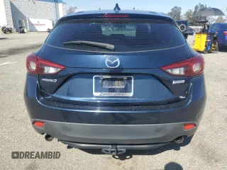 2014 Mazda 3 S Touring with VIN JM1BM1L31E1162990, listed as a Copart auction lot 51667034 with 92,255 mi miles and Salvage Title. Bid and sale history available at DreamBid. Image 6.