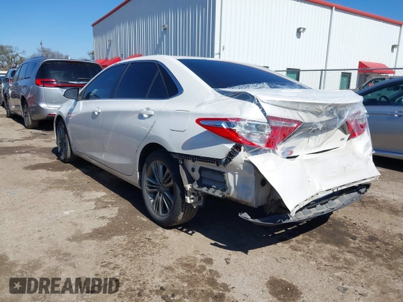 2015 Toyota Camry XLE with VIN 4T1BF1FK5FU114661, listed as a IAAI auction lot 41633878 with 124,013 mi miles and . Bid and sale history available at DreamBid. Image 3.