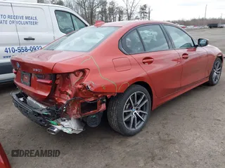 2022 BMW 3 Series 330i xDrive with VIN 3MW5R7J08N8C69862, listed as a IAAI auction lot 41695326 with 56,724 mi miles. Bid and sale history available at carsss.com. Image 4.
