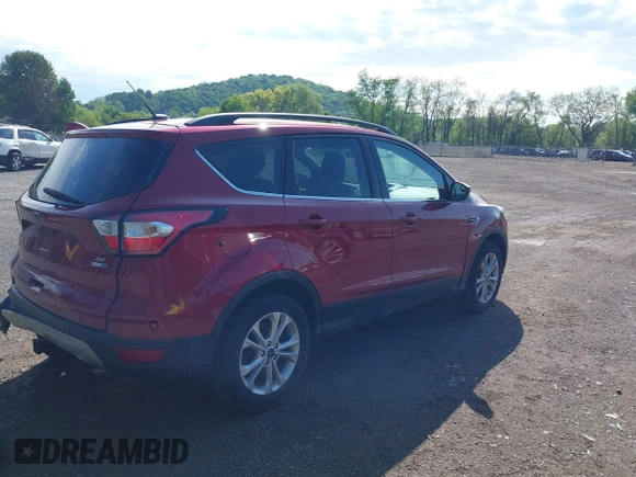 2018 Ford Escape SE z VIN 1FMCU9GD8JUB33366, wystawiony jako IAAI lot #42264706 z przebiegiem 48 478 mil mil oraz . Historia ofert i sprzedaży dostępna na DreamBid. Obrazek 4.
