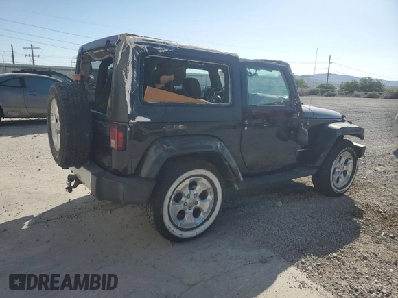 2015 Jeep Wrangler Sahara with VIN 1C4AJWBG5FL733795, listed as a Copart auction lot 61998255 with 86,655 mi miles and Salvage title. Bid and sale history available at DreamBid. Image 3.