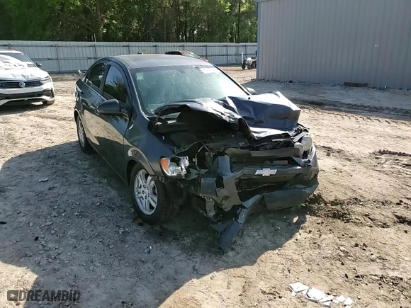 2014 Chevrolet Sonic LT with VIN 1G1JC5SHXE4127939, listed as a Copart auction lot 52174335 with 118,684 mi miles and Salvage Title. Bid and sale history available at carsss.com. Image 13.