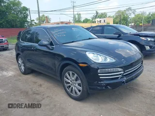 2014 Porsche Cayenne z VIN WP1AA2A21ELA09887, wystawiony jako IAAI lot #42456200 z przebiegiem 123 442 mil mil oraz . Historia ofert i sprzedaży dostępna na DreamBid. Obrazek 1.