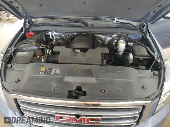 2015 GMC Yukon SLT z VIN 1GKS2BKC0FR630731, wystawiony jako Copart lot #55359445 z przebiegiem Nie podano mil oraz Szkoda całkowita • Salvage title. Historia ofert i sprzedaży dostępna na DreamBid. Obrazek 12.