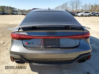 2022 Audi RS 7 z VIN WUAPCBF22NN912345, wystawiony jako Copart lot #41202044 z przebiegiem 5076 mil mil oraz Szkody całkowita. Historia ofert i sprzedaży dostępna na DreamBid. Obrazek 6.